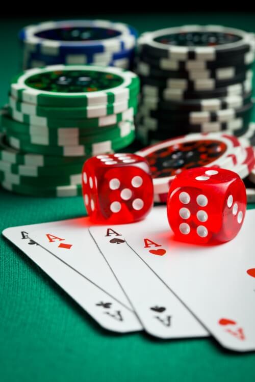 online business opportunity, cards, dices and chips on a poker table